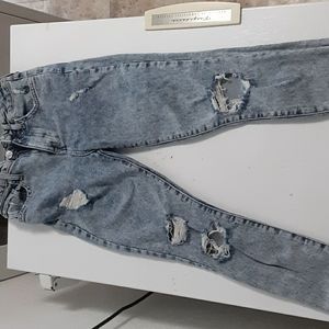 High waisted bleached torn jeans